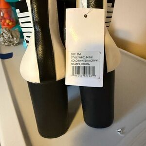 Juicy Couture Black and White Heeled Boots